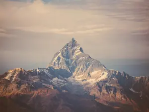 How do mountains keep themselves warm during winter?