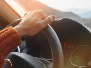 What did the woman ask God for while driving?