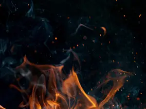 What do you call a flame who stays out partying all night?
