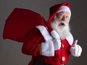 What does Santa use to help himself walk?