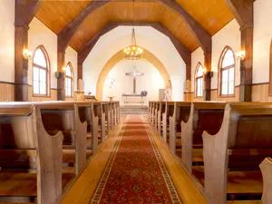 What does the pastor's son say whenever he walks into the chapel?