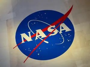 What grade did the NASA employee get on her exam?