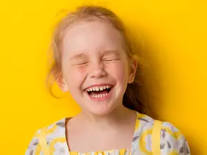 What is red, orange, and yellow and doesn't get hurt when it falls?