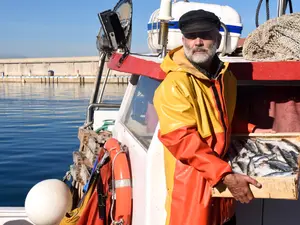 Where do fishermen look to hire more crew?