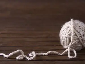 Who won the race between two balls of string?