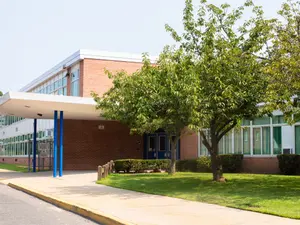 Who's in charge of the school during summer vacation?