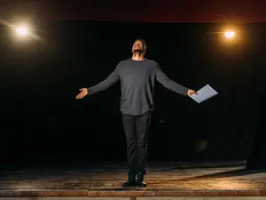 Why did the actor jump into the orchestra pit?