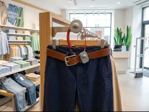 Why did the belt get arrested at the clothing store?