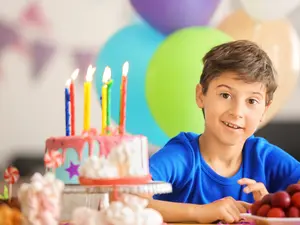 Why did the boy spit out his birthday dessert?