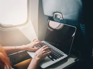 Why did the girl study in the airplane?