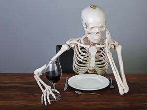 Why did the skeleton attend the backyard barbecue?