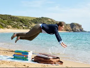 Why did the teacher dive into the sea?