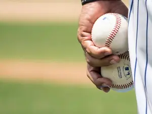 Why is a baseball game a good place to go on a hot day?