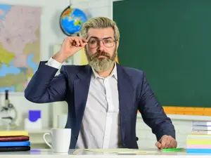 Why was the school superintendent asked to resign?